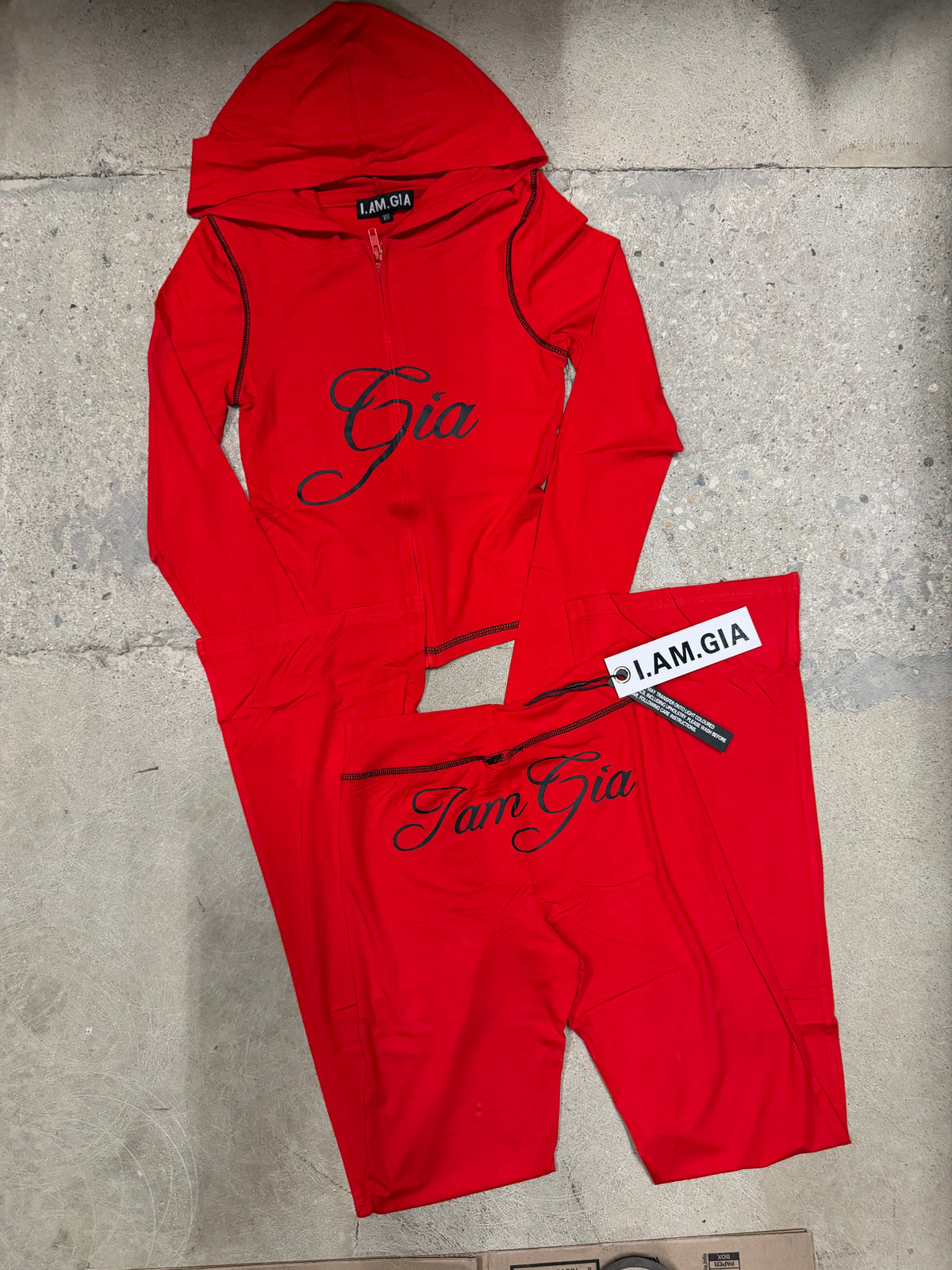 I.AM.GIA red set with black lettering